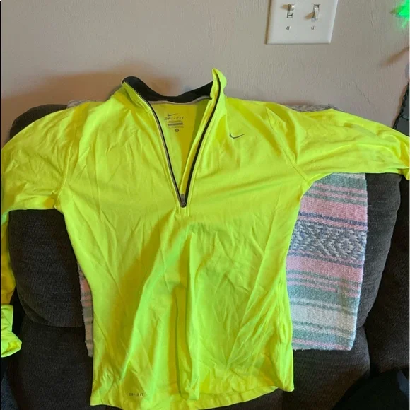 Nike dry fit neon yellow quarter zip with thumb holes, very lightly